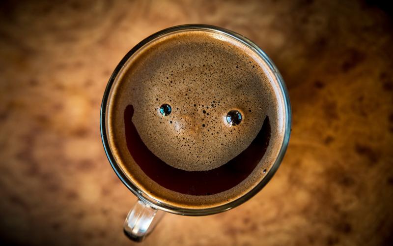 Smiling coffee cup viewed from above